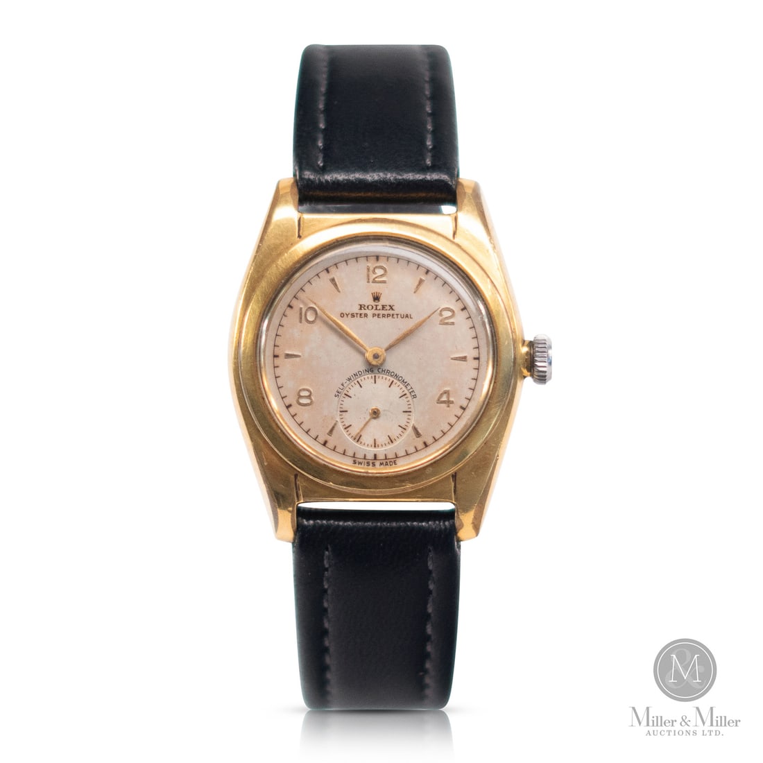 Rolex, Ref. 2764 Oyster Perpetual: Swiss. Gold-filled. This "Bubbleback" represents the pinnacle of Rolex’s early luxury-tier engineering, combining the brand’s first-generation automatic movement. The silhouette is defined by its