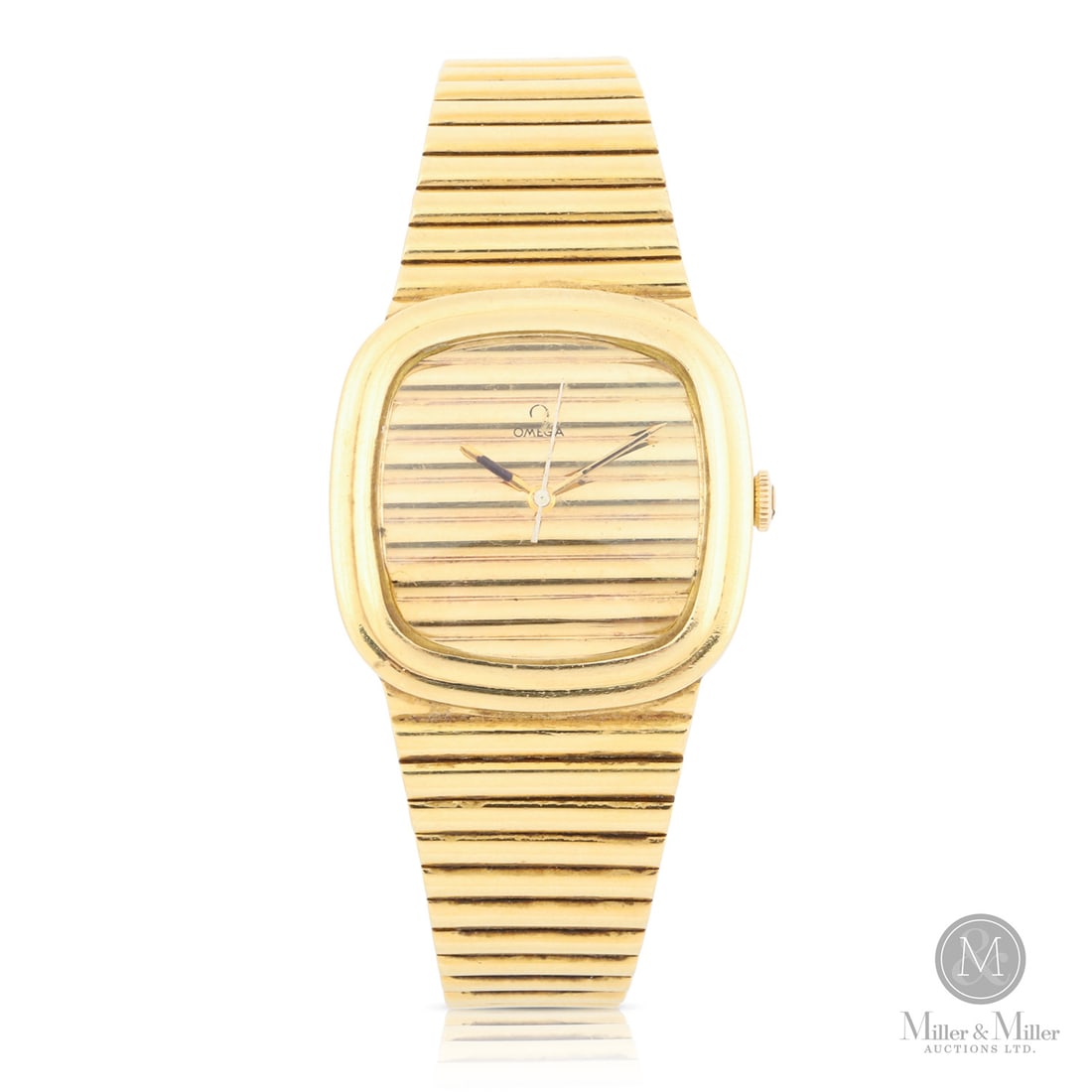 Omega, 18K Integrated Bracelet: Swiss. 18K yellow gold. This rare 18K yellow gold Omega dress watch (case, dial and bracelet), dating to approximately 1966, represents the pinnacle of mid-century Swiss luxury and textured jewelry-in