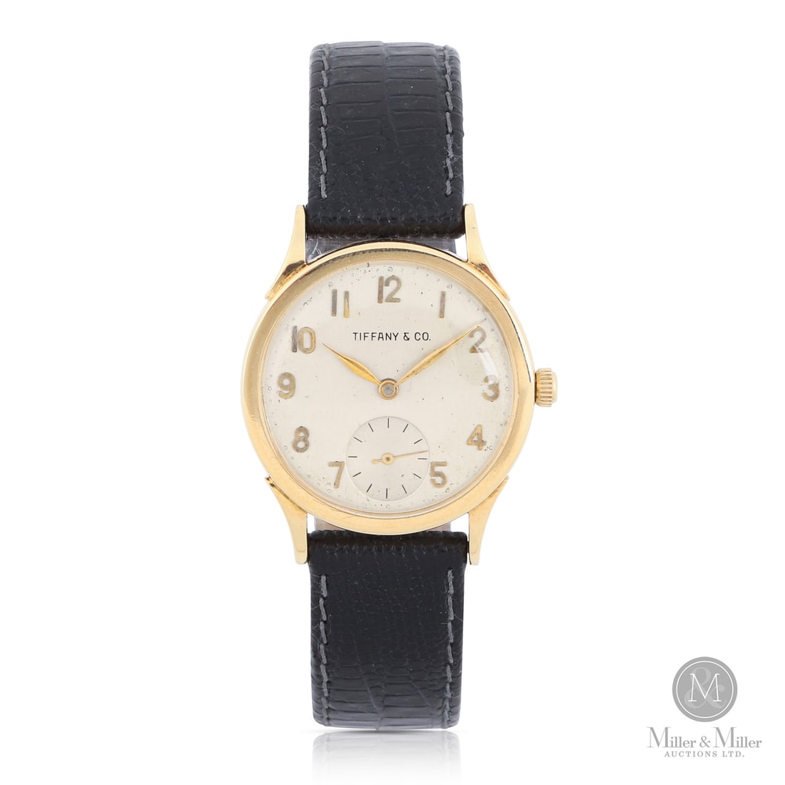 IWC for Tiffany & Co., 14K: Swiss. 14K yellow gold. This 1940s timepiece represents a significant partnership between Tiffany & Co. and IWC Schaffhausen, featuring a 17-jewel Swiss manual wind movement (calibre C83, HXB, SN 1054
