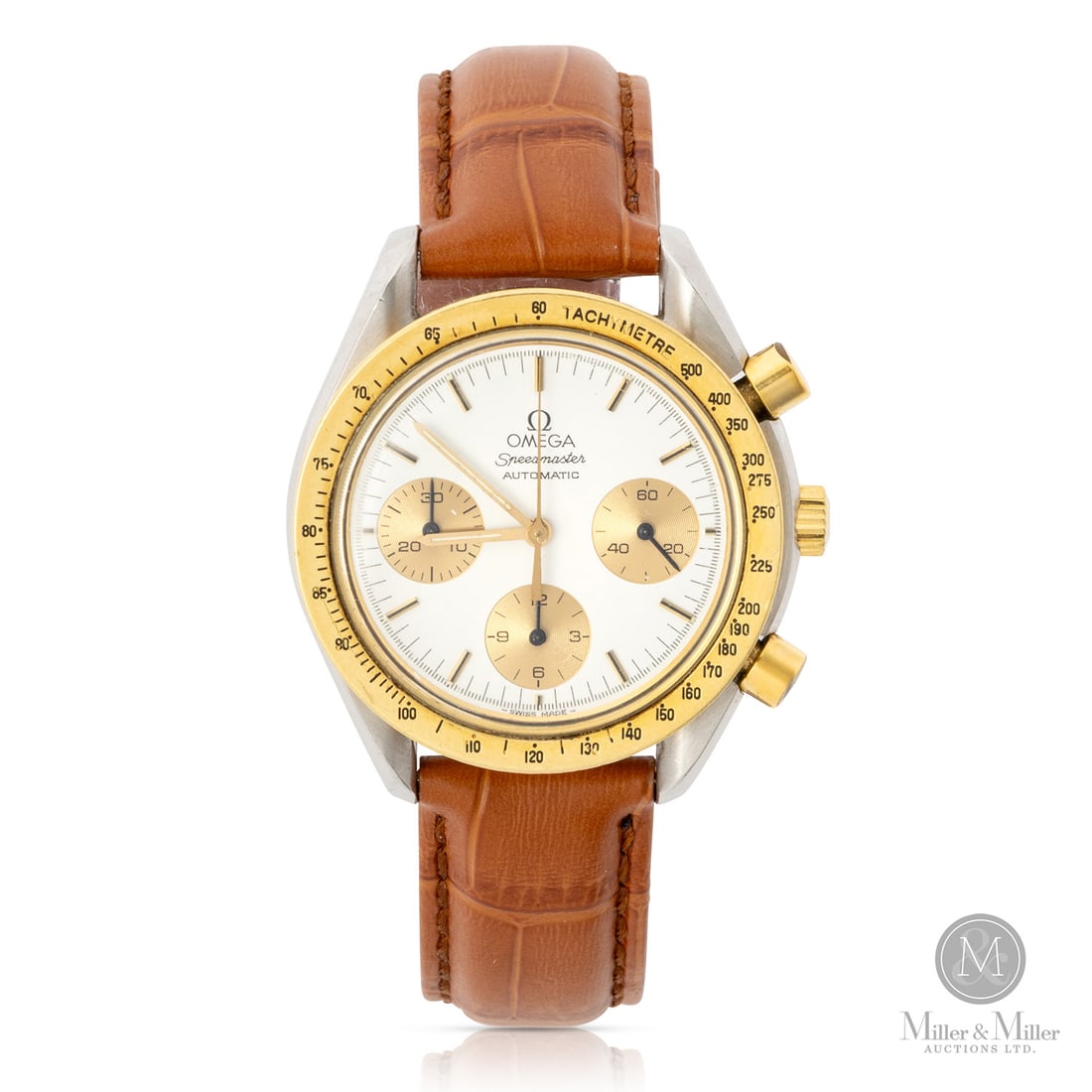 Omega, Ref. 175.0033 Speedmaster Reduced: Swiss. Stainless steel case. 18K gold bezel. The Omega Speedmaster Reduced was introduced in 1988 as a more compact, automatic alternative to the classic hand-wound Professional, specifically designed