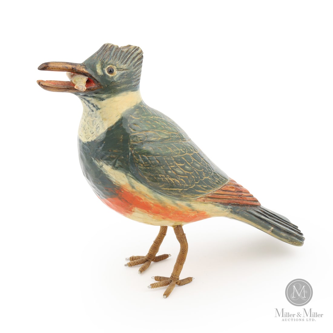 Yvon Coté Kingfisher: Grande-Vallée, Québec. C. 1980. Painted wood. A finely crafted carving of a Kingfisher with a fish in his mouth by renowned Grande-Vallee, Quebec carver Yvon Coté. His carvings are recognized by th