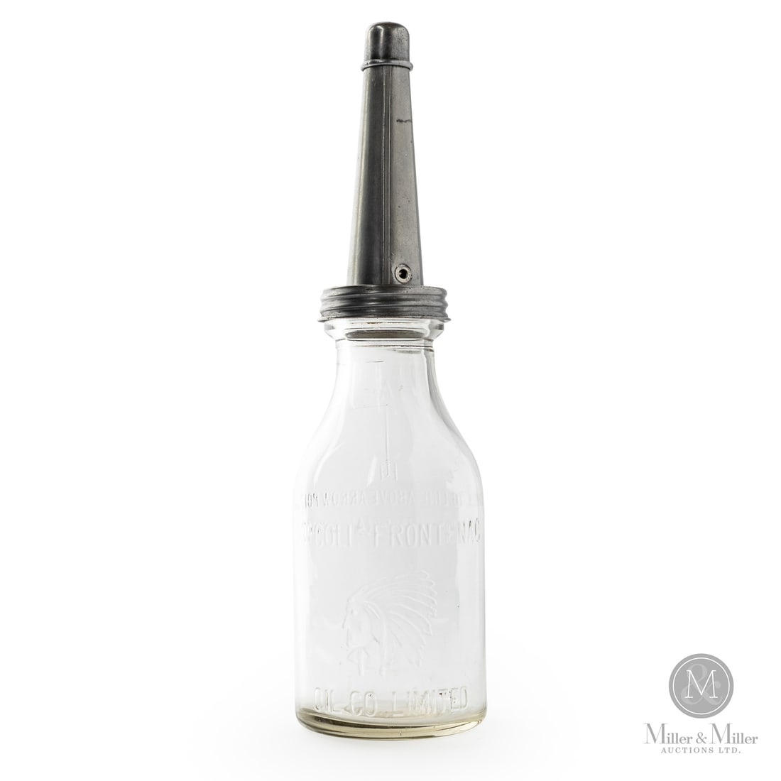 McColl-Frontenac Pint Oil Bottle: 1927 - 1941. Glass bottles with tin spouts. Embossed. Shelf wear underneath. Minor lip flecks. Retains spout and cap. 15.5" x 4" Dia. Size 15.5" x 4" Dia. Condition Shelf wear underneath. Minor lip