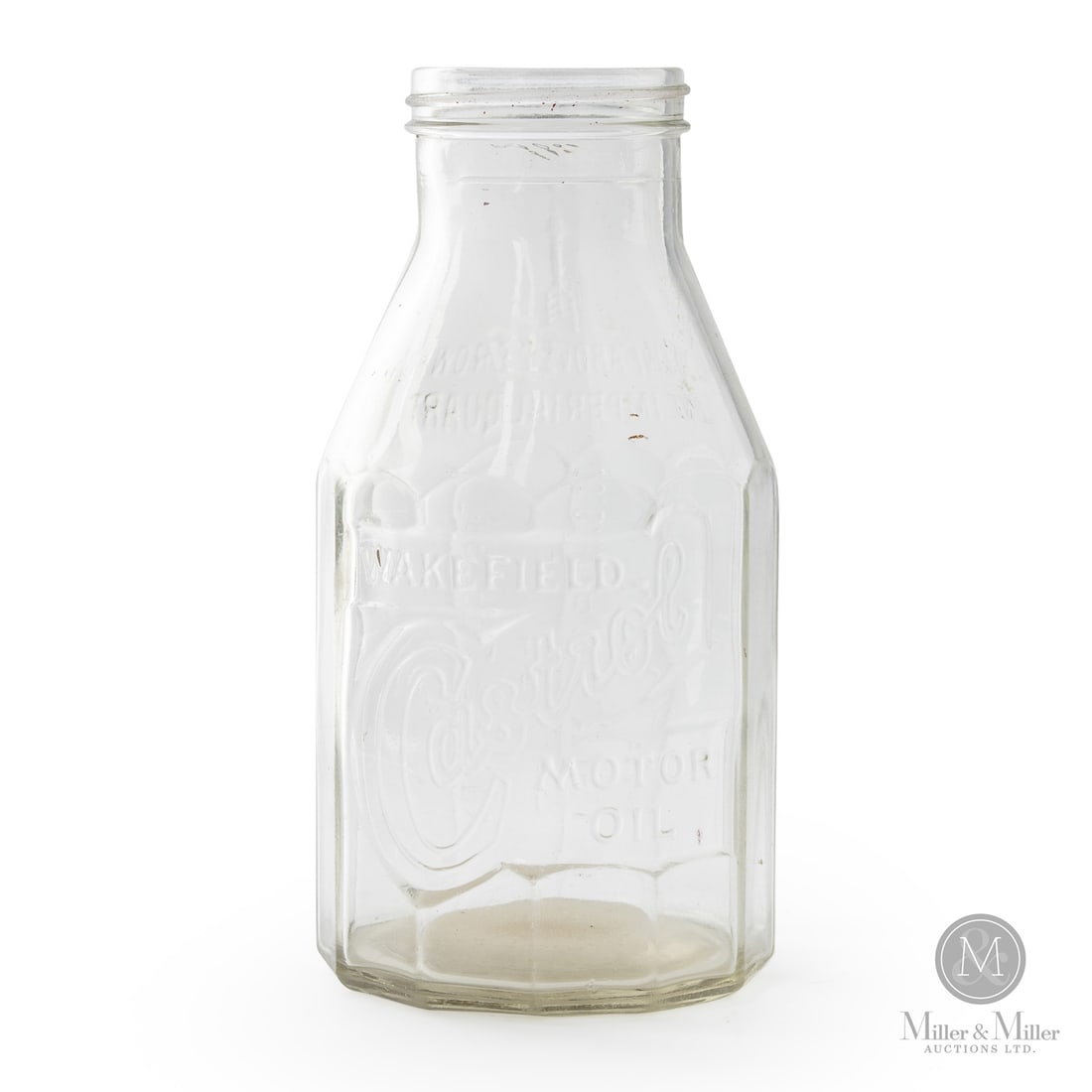 Wakefield Castrol Motor Oil Bottle: 1930s. Embossed. Minor haze, scuffs. Shelf wear underneath. 8.5" x 4.25" Dia. Size 8.5" x 4.25" Dia. Condition Minor haze, scuffs. Shelf wear underneath.