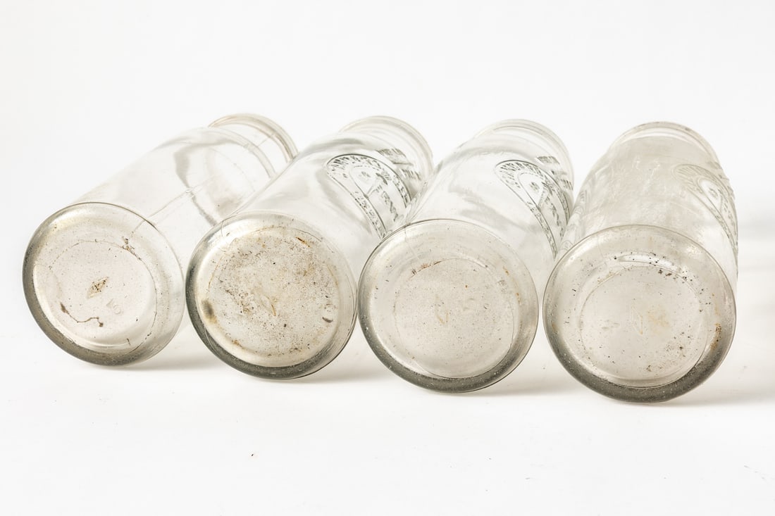 Standard Oil Quart Bottles in 8-Bottle Wire Carrier - 10