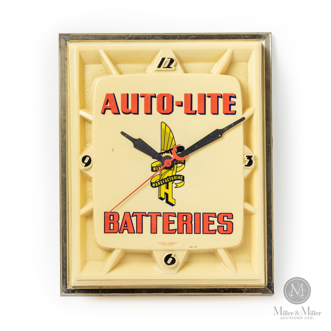Auto-Lite Batteries Clock: 1950-1961. Vacuum-formed plastic. From the Pat and Late Geoff Hopps Collection. All items are guaranteed authentic by Miller & Miller Auctions. All purchases are eligible for free delivery to the