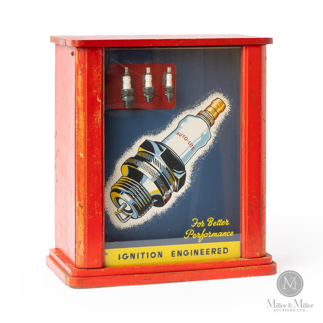 Auto-Lite Spark Plugs Countertop Display: 1936-1948. Reverse-painted glass. This display was made in Sarnia, Ontario, by the Electric Auto-Lite Ltd. company, the Canadian subsidiary of the American Electric Auto-Lite Company of Toledo, Ohio. 