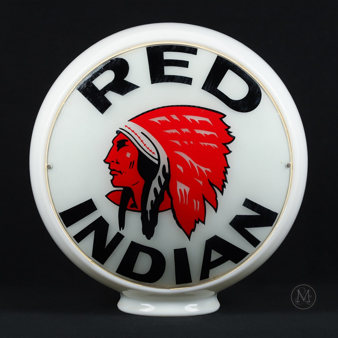 Red Indian Gasoline Pump Globe: 1927 - 1941. Two reverse baked glass lenses. Milk glass body. All items are guaranteed authentic by Miller & Miller Auctions. All purchases are eligible for free delivery to the Check the Oil Show on 
