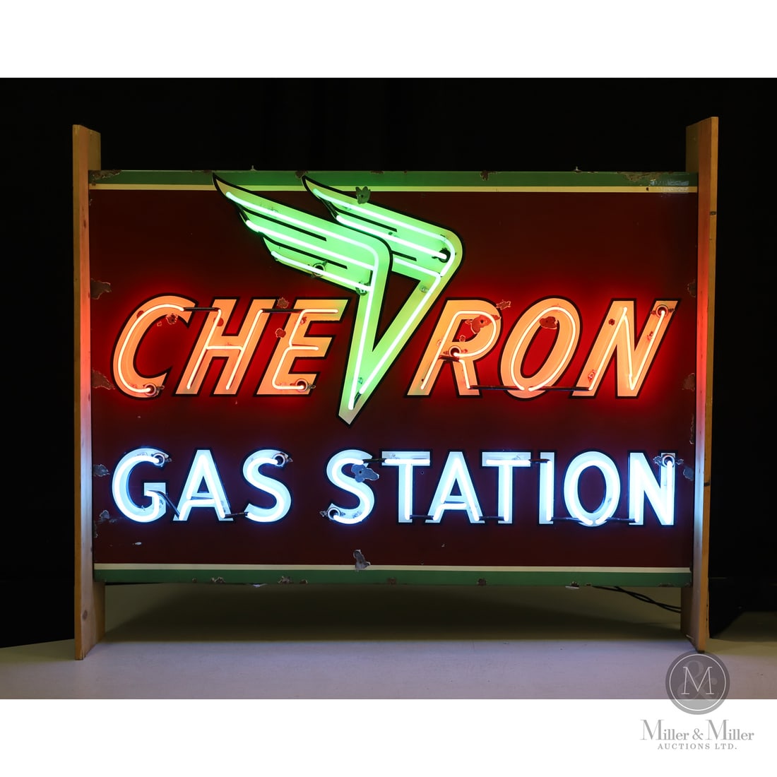 Chevron Gas Station Neon Sign: 1945-1955. Single-sided porcelain (SSP). The Chevron "winged V" logo was introduced in 1945 as a patriotic nod to the Allied WWII victory overseas. Authenticated by The Authentication Company (TAC