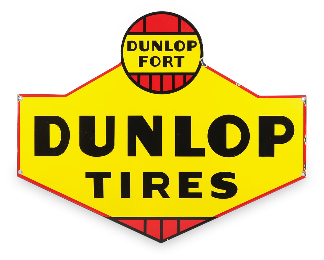 Dunlop Tires Curb Sign: 1940s. Single-sided porcelain (SSP). Die-cut. All items are guaranteed authentic by Miller & Miller Auctions. All purchases are eligible for free delivery to the Check the Oil Show on June 26, 2026. 2