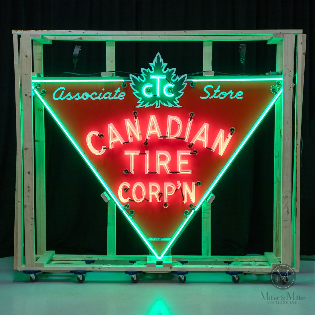 Canadian Tire Corp'n Associate Store Neon Sign: 1940-1950. Single-sided porcelain (SSP) signs mounted to opposing sides. Die-cut. Ironically, the Canadian Tire triangular motif that is instantly recognizable by most Canadians today was actually ins