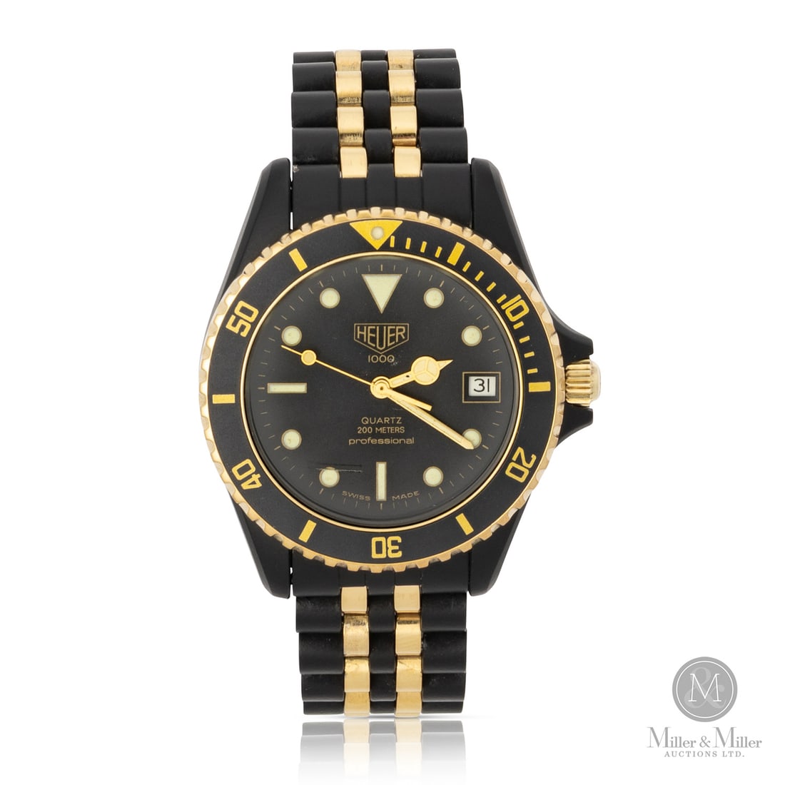 Heuer, Ref. 980.020L 1000 Diver: Swiss. Two-tone: Stainless steel. Yellow gold. The Heuer 1000 Series diver represents a significant chapter in horological history, marking the era immediately preceding the company's acquisition by