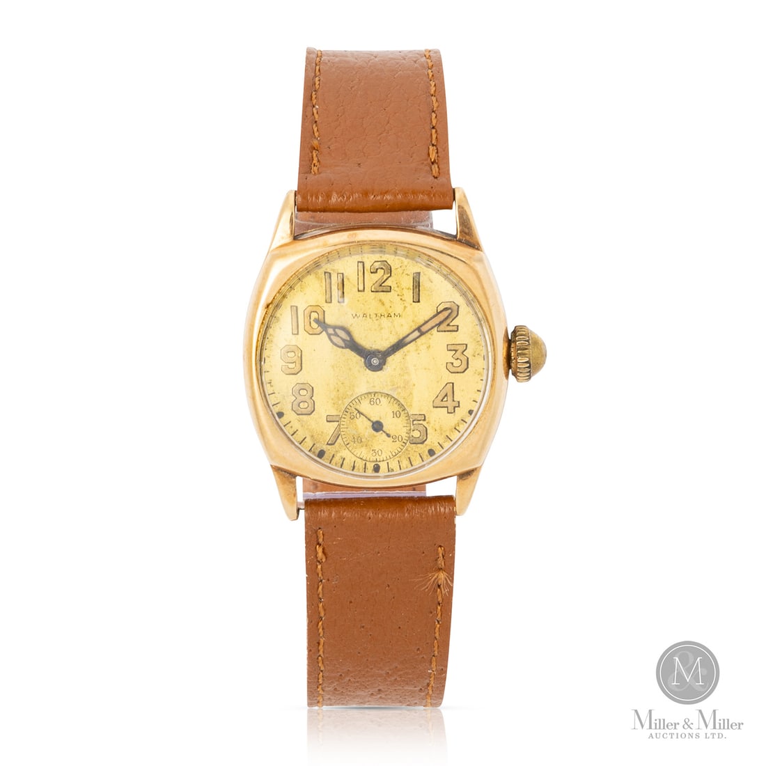 Waltham, 14K Sapphire Cushion Case: American. 14K yellow gold. This Waltham Sapphire is a stunning example of mid-century American elegance, featuring a distinctive cushion-shaped case. Crafted from solid 14K yellow gold, the case