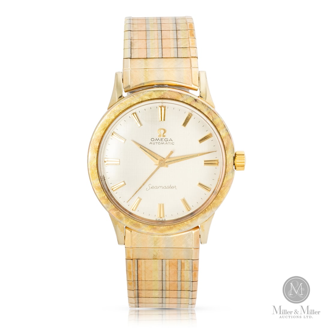 Omega, Ref. L6300 Seamaster: Swiss. Gold-filled. The Omega Seamaster Automatic is a vintage classic featuring a gold-filled textured rainbow pattern on case and bracelet. The timepiece is anchored by a matching, original