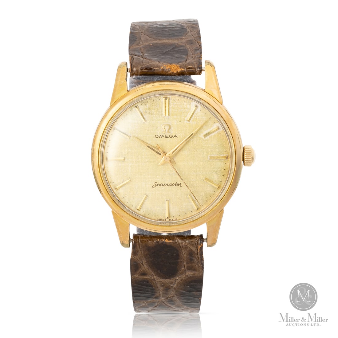 Omega, Ref. 14390.61.CSP Seamaster: Swiss. Gold-filled. The Omega Seamaster reference 14390.61.CSP is a remarkable vintage piece. This center seconds model features a linen-textured dial, giving it a warm, character-rich aesthetic. The