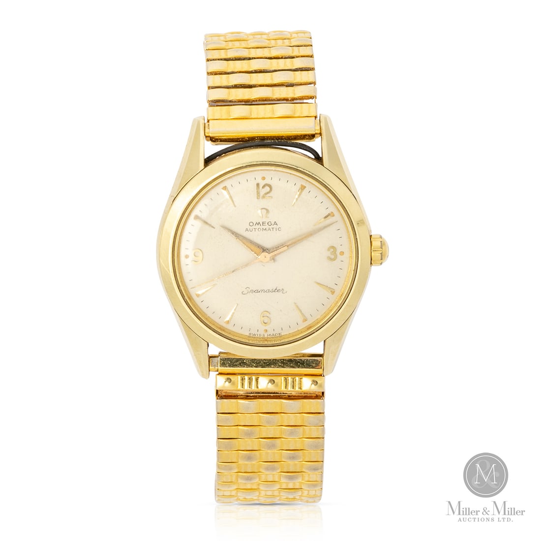 Omega, Ref. 2802-14SC Seamaster: Swiss. Gold-plated. The Omega Seamaster reference 2802-14 SC is a sophisticated timekeeper defined by its clean lines and distinct faceted lugs. This reference is powered by a caliber 471 automatic