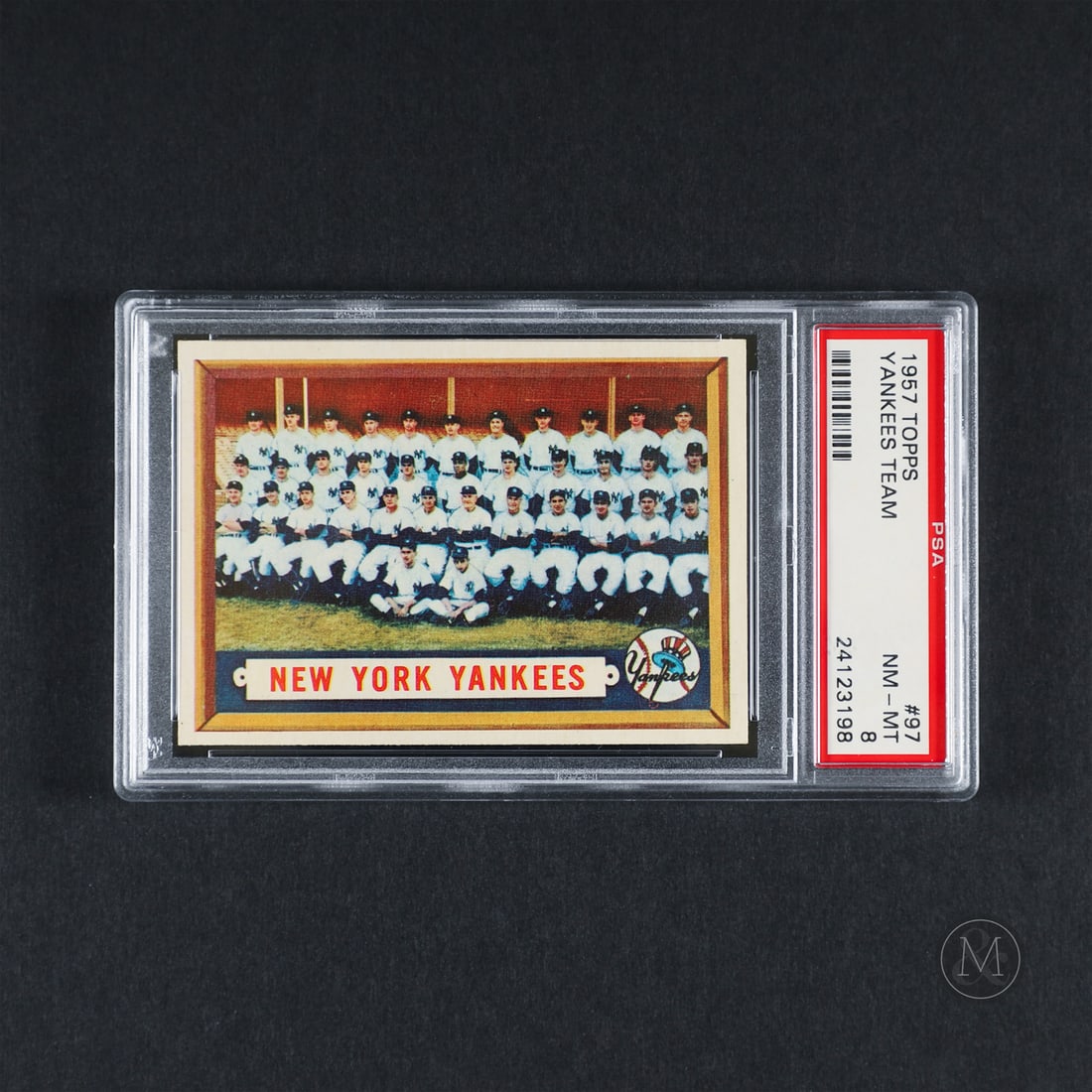 1957 Topps #97 New York Yankees Team (PSA 8 NM-MT): Offered here is the 1957 Topps Yankees Team card (#97). This full team issue is significant as it features the entire World Series winning 1956 New York Yankees Team. The 1956 New York Yankees