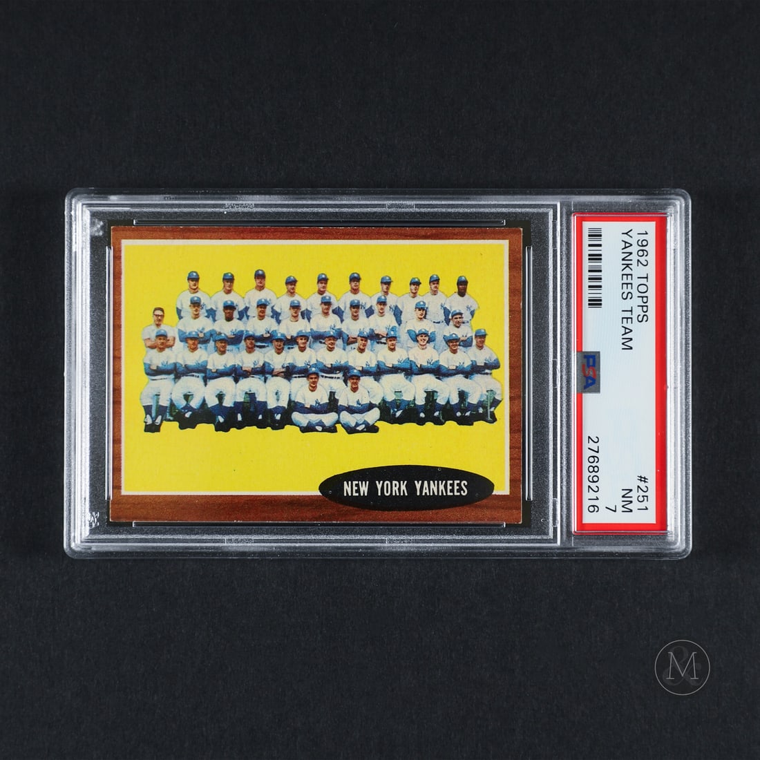 1962 Topps #251 Yankees Team (PSA 7 NM): Offered here is the 1962 Topps New York Yankees Team card (#251). This issue is significant as it features a complete team photograph documenting the defending World Series champion roster, anchored b