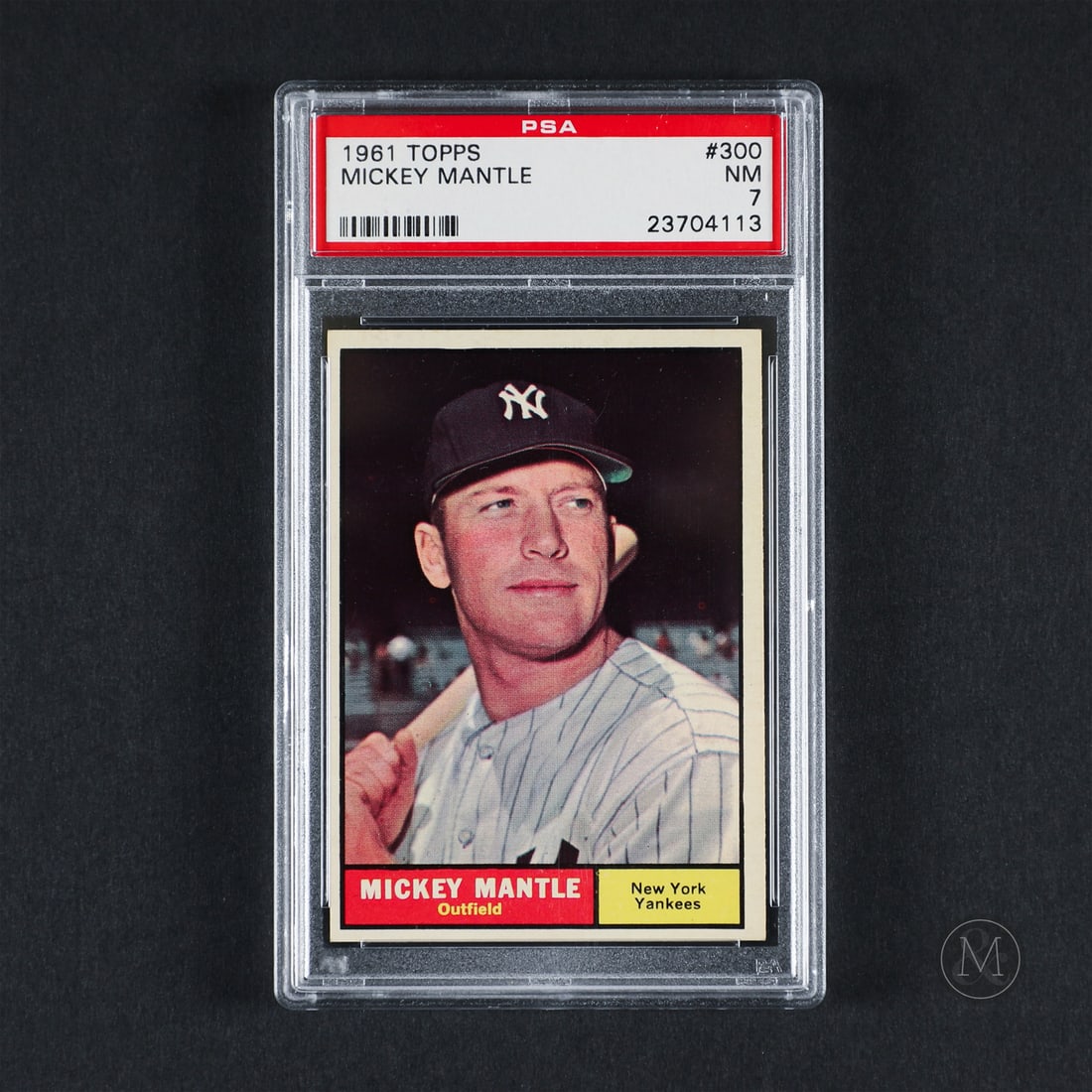 1961 Topps #300 Mickey Mantle (PSA 7 NM): Offered here is the 1961 Topps Mickey Mantle base card (#300). This issue is significant as a central checklist anchor released during the historic 1961 home run chase between Mantle and teammate Roge