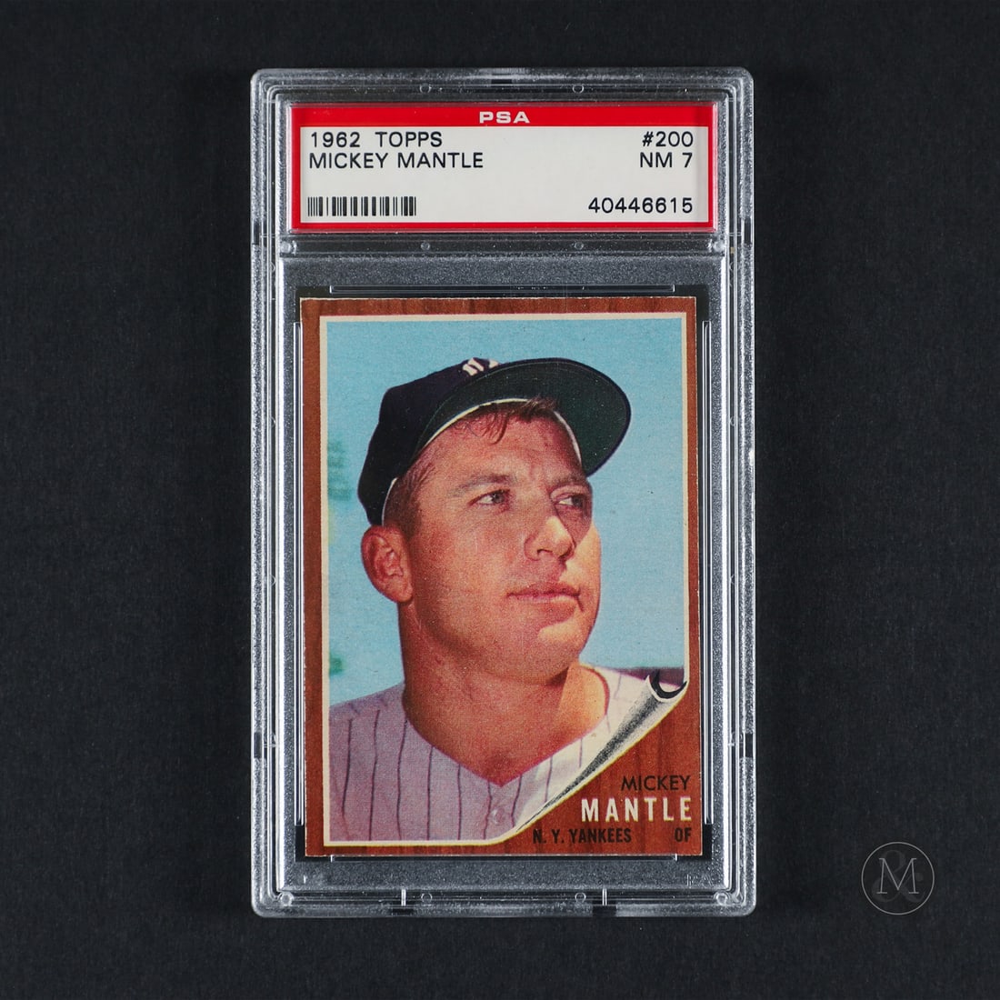 1962 Topps #200 Mickey Mantle (PSA 7 NM): Offered here is the 1962 Topps Mickey Mantle (#200). The issue is the base Mantle from the 1962 set and features the Yankees legend in bold headshot. Mickey Mantle played his entire 18-year career