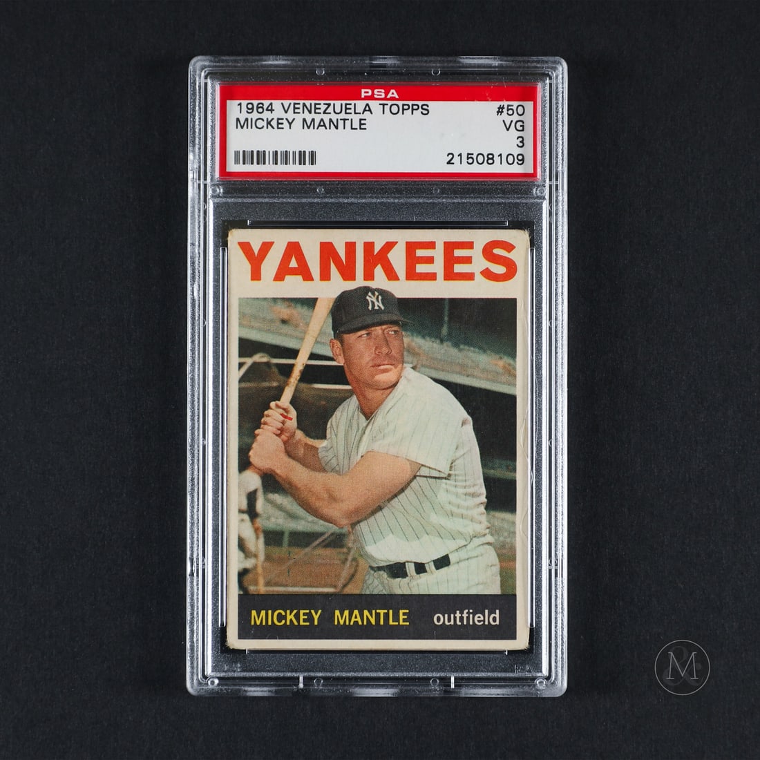 1964 Venezuela Topps #50 Mickey Mantle (PSA 3 VG): Offered here is the rare 1964 Topps Venezuela Mickey Mantle base card (#50). This international issue is highly significant as a foreign market variation, utilizing flat back-stock processing