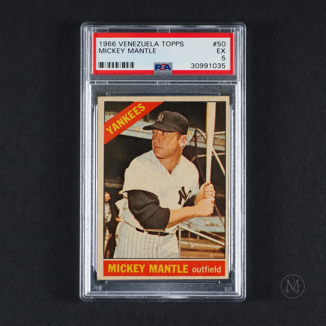 1966 Venezuela Topps #50 Mickey Mantle (PSA 5 EX): Offered here is the rare 1966 Topps Venezuela Mickey Mantle, a top 15 known example from PSA, base card (#50). This international issue is highly significant due to its specialized non-glossy, dark