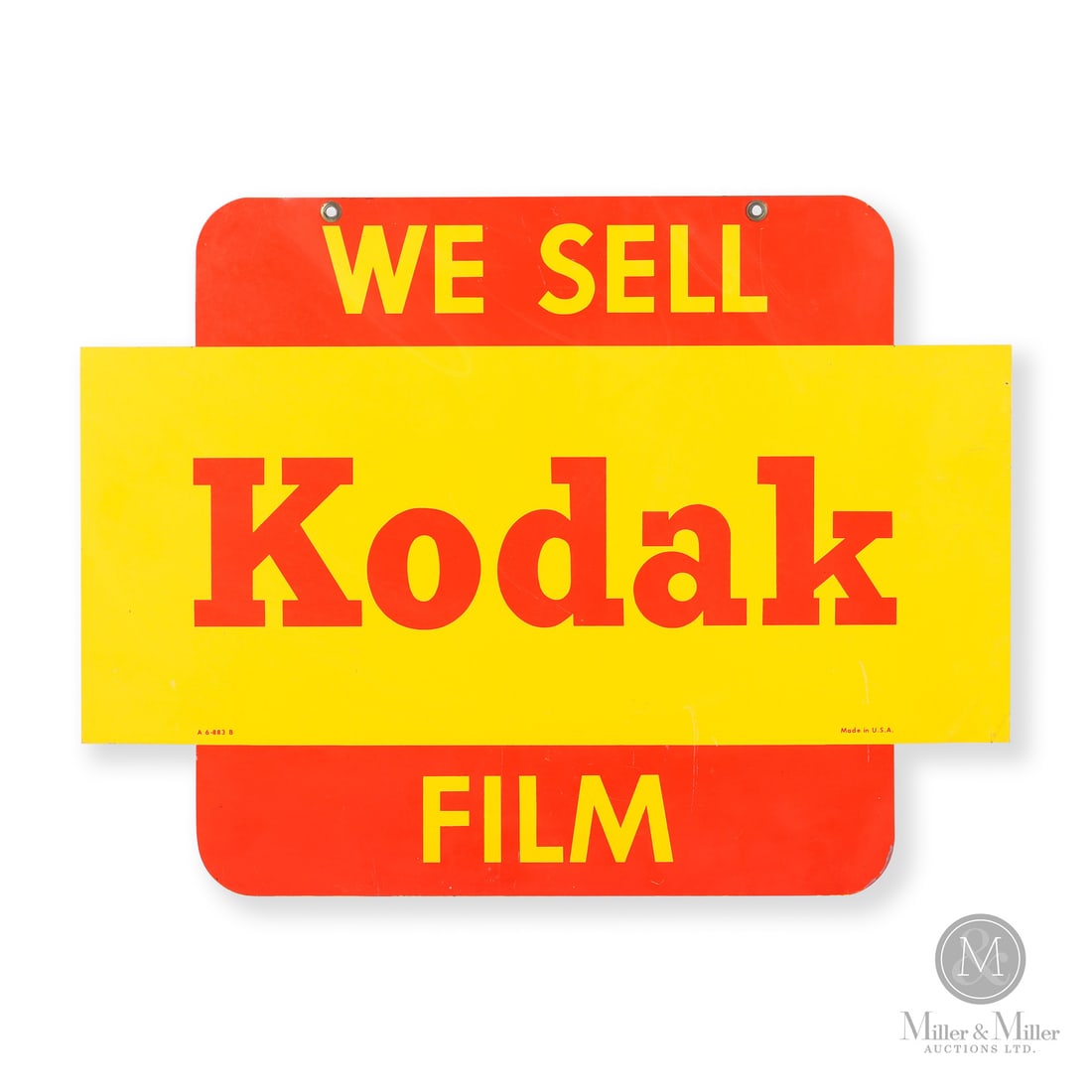 Kodak Film Hanging Sign: Made in U.S.A. 1955 - 1965. Double-sided painted metal (DSPM). Die-cut. Marked, "A 6-883 B" lower left quarter and "Made in U.S.A." lower right quarter. Authenticated by The Authentication Company