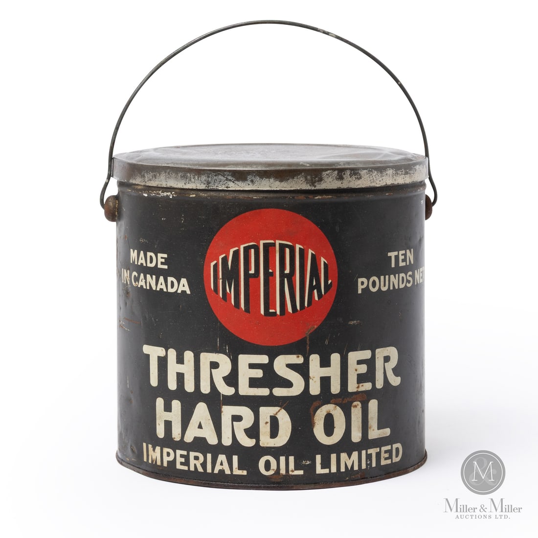 Imperial Oil Thresher Hard Oil 10 lb Can: Made in Canada. 1920 - 1930. Lithographed Tin. Specialized farm lubricant for threshing equipment. Marked, "MACDONALD MFG CO LIMITED TORONTO." lower edge. Authenticated by The Authentication Company