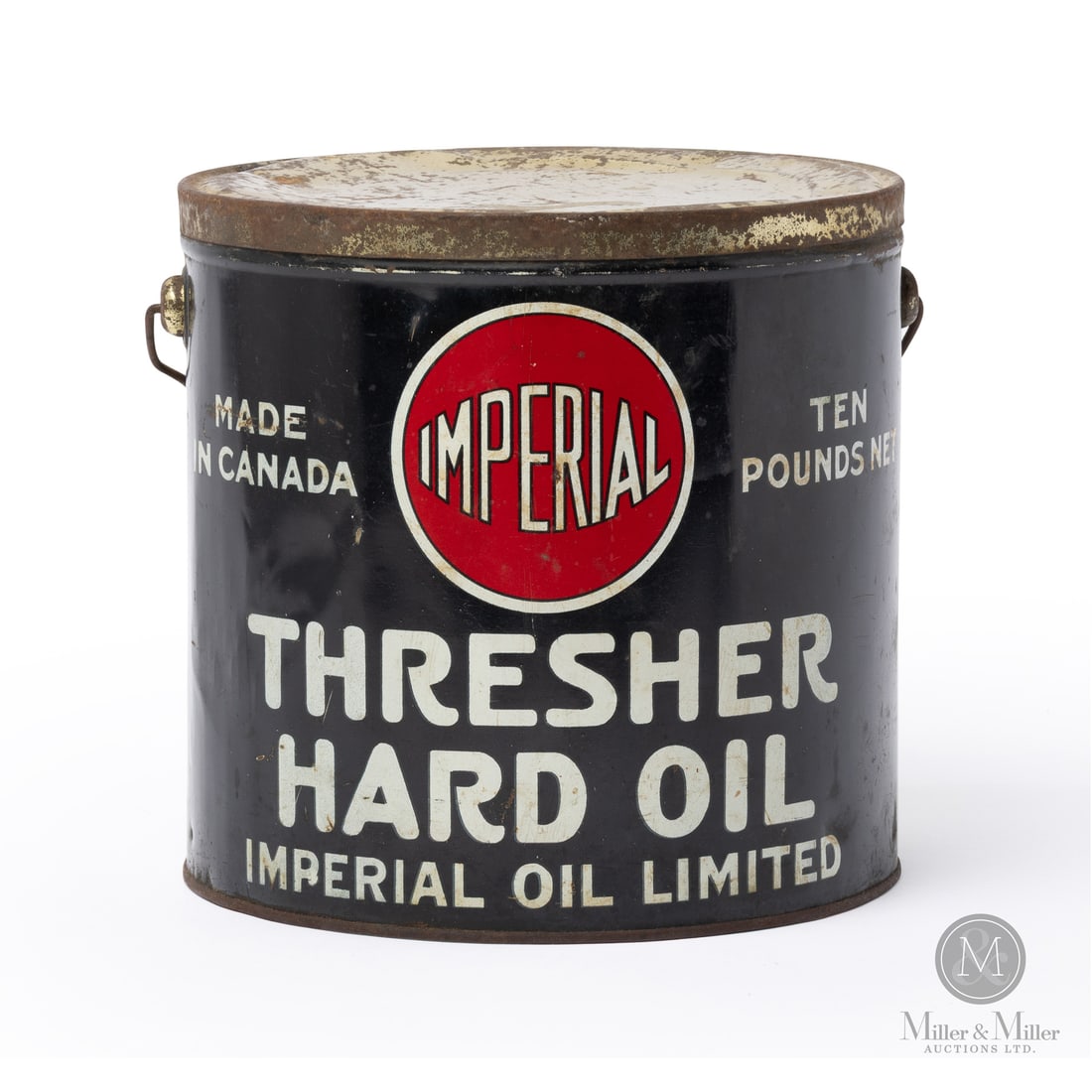 Imperial Oil Thresher Hard Oil 10 lb Can: Made in Canada. 1920 - 1930. Lithographed Tin. Specialized farm lubricant for threshing equipment. Marked, "M" lower edge. Authenticated by The Authentication Company (TAC #501701). All items are guar