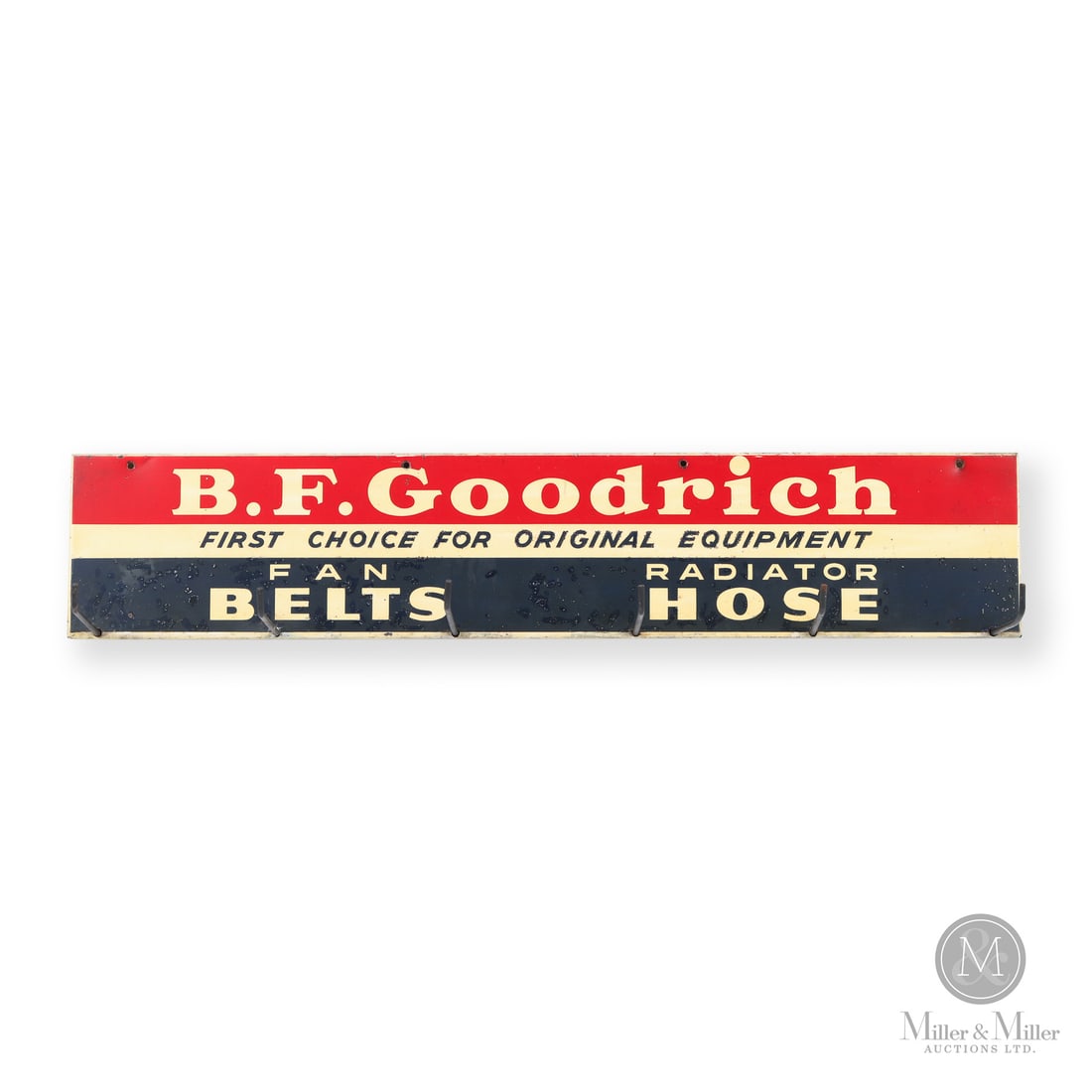 B.F. Goodrich Belt Hose Rack: Made in U.S.A. 1960 - 1970. Single-sided painted metal (SSPM). Features the “First choice for original equipment” slogan. Functional point-of-sale rack for B.F. Goodrich belts and hoses.