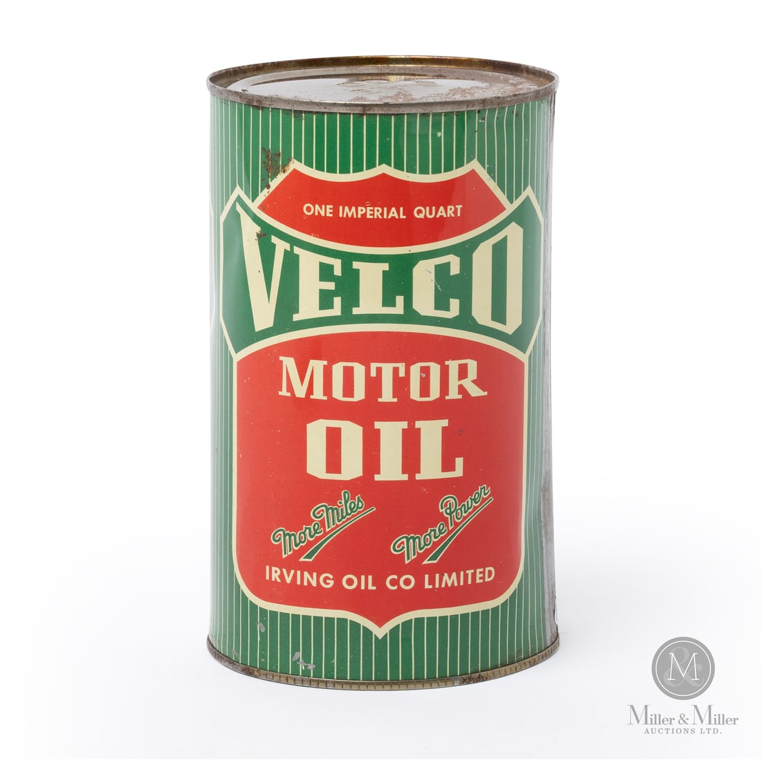Irving Velco Motor Oil Imperial Quart Can: Made in Canada. 1953. Lithographed Tin. The background consists of green and white vertical pinstripes, which is an unusual and intricate graphic pattern for standard motor oil tins of the decade. Mar