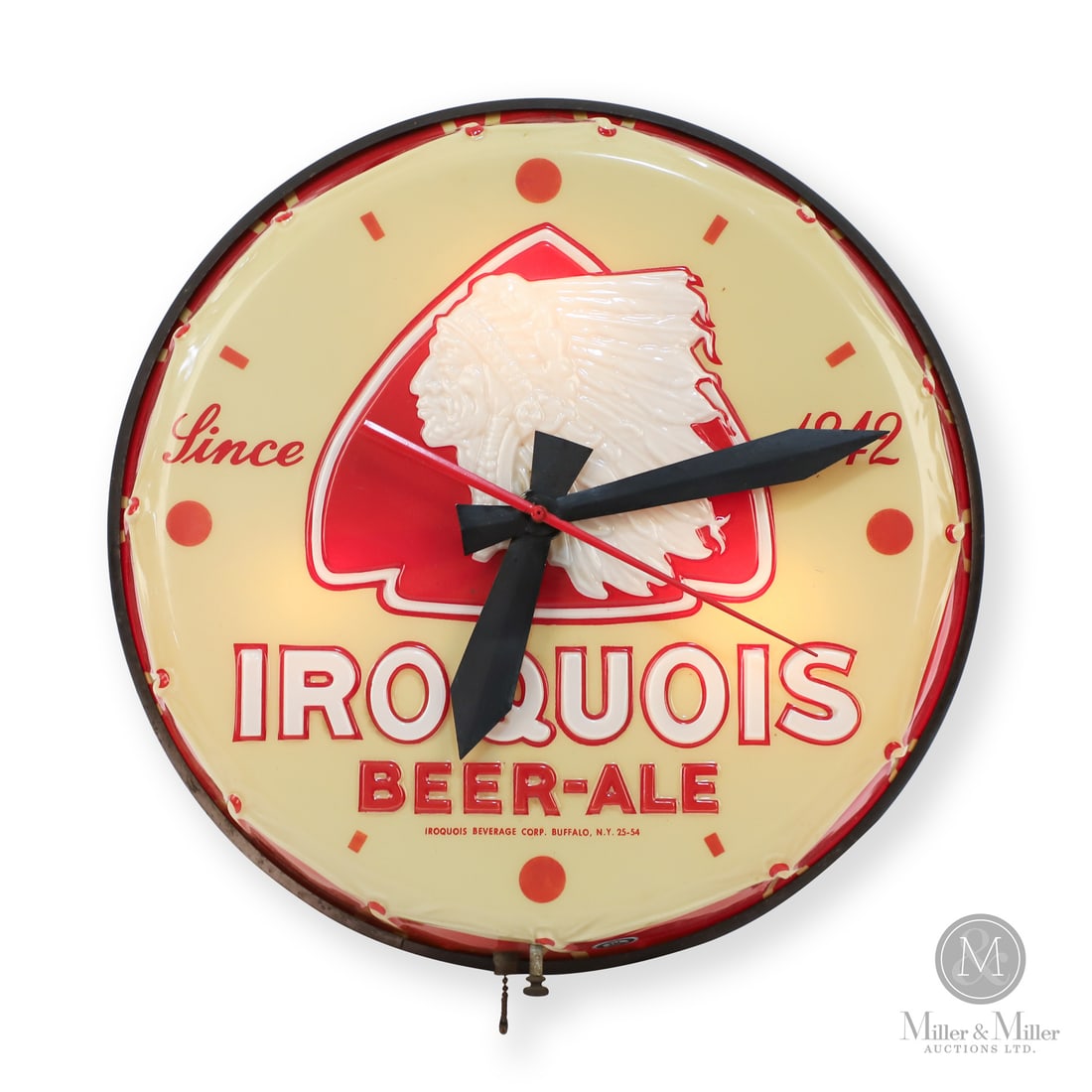 Iroquois Beer-Ale Backlit Clock: Made in U.S.A. 1950 - 1960. Lithographed plastic. Since 1842. Vacuum formed plastic in the shape of a drum with a tin back. The Iroquois Brewing Company operated in Buffalo, New York, from 1892 to 197