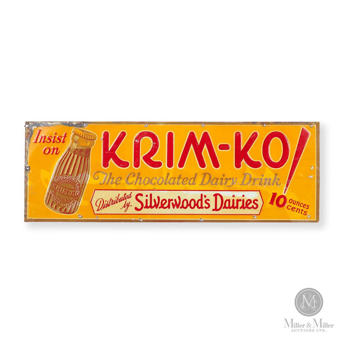 Krim-Ko Chocolate Milk Sign: Made in Canada. 1930 - 1939. Single-sided tin (SST). Embossed. Distributed by Silverwoods Dairies. Marked, "ST. THOMAS METAL SIGNS, LTD., ST. THOMAS, ONT" lower centre edge. 9.5" x 28". Authenticated 