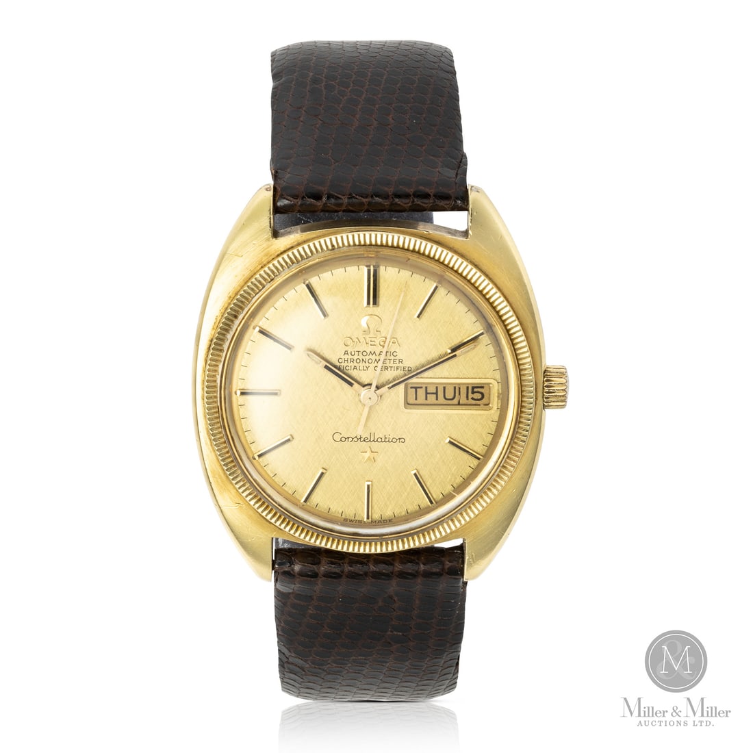 Omega Constellation Date Gold Capped, Ref. 168.029: Swiss. Gold-capped. This vintage Omega Constellation Automatic Chronometer Reference 168.029 features a gold-capped C-shaped style case accented by a gold-fluted bezel. The matching champagne/gold tex