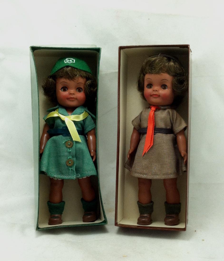 2 MIB Effanbee Scout Dolls Girl & Brownie: Both 7 1/2", movable heads, arms, legs. Each is mint in their box. Marked on their backs "Effanbee & 1965".
