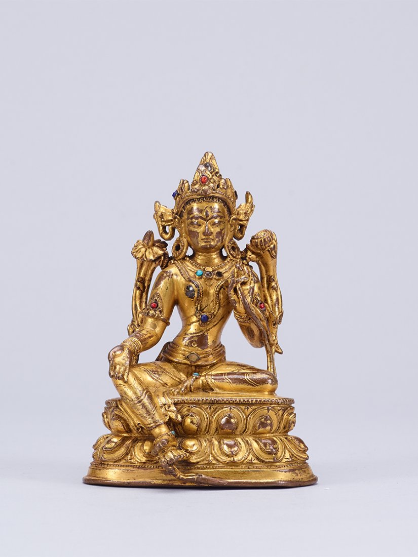 A GILT-BRONZE FIGURE OF GREEN TARA (1 of 1)