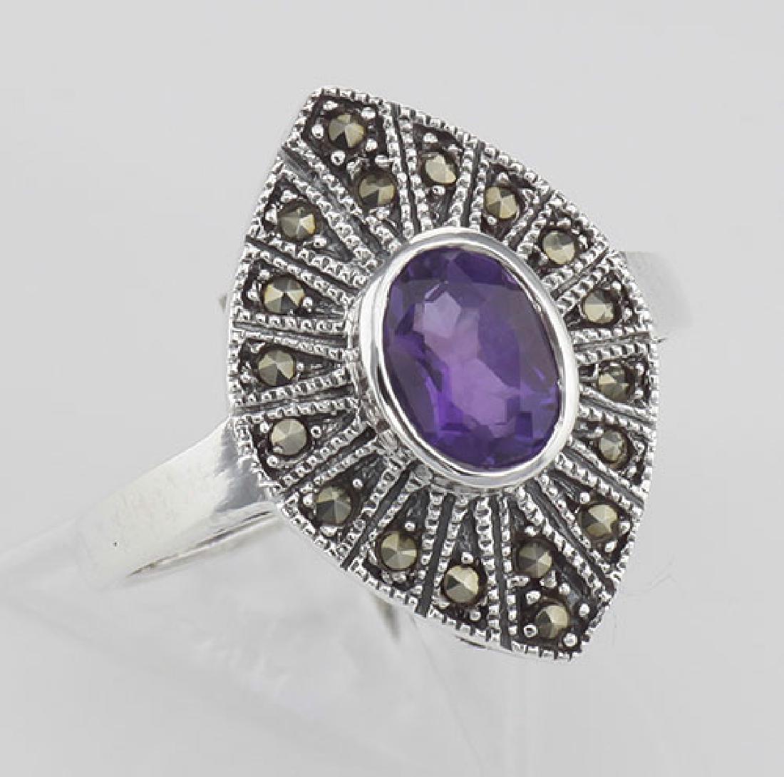 Lovely 1/2 Carat Genuine Amethyst and Marcasite Ring -: Lovely 1/2 Carat Genuine Amethyst and Marcasite Ring - Sterling Silver **|**|** #R-391 This nice Amethyst Ring features a 1/2 Carat Amethyst Gemstone surrounded by sparklely Marcasites set in an Antiq