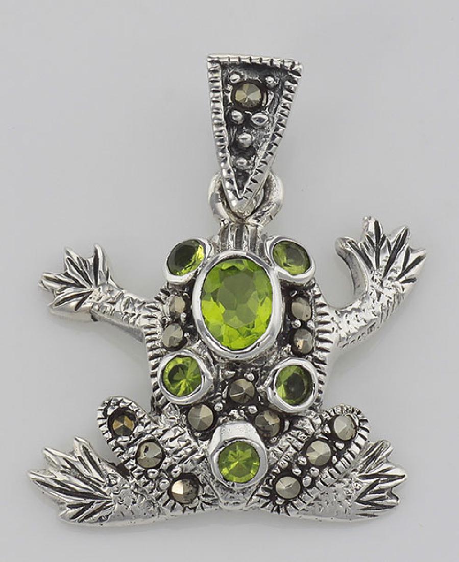 Cute Green CZ and Marcasite Frog Pendant - Sterling Sil: Cute Green CZ and Marcasite Frog Pendant - Sterling Silver **|**|** #HP-791 This cute little Sterling Silver Frog Pendant with Marcasite and Green Cubic Zirconia has a hanging length of approx. 1 inch