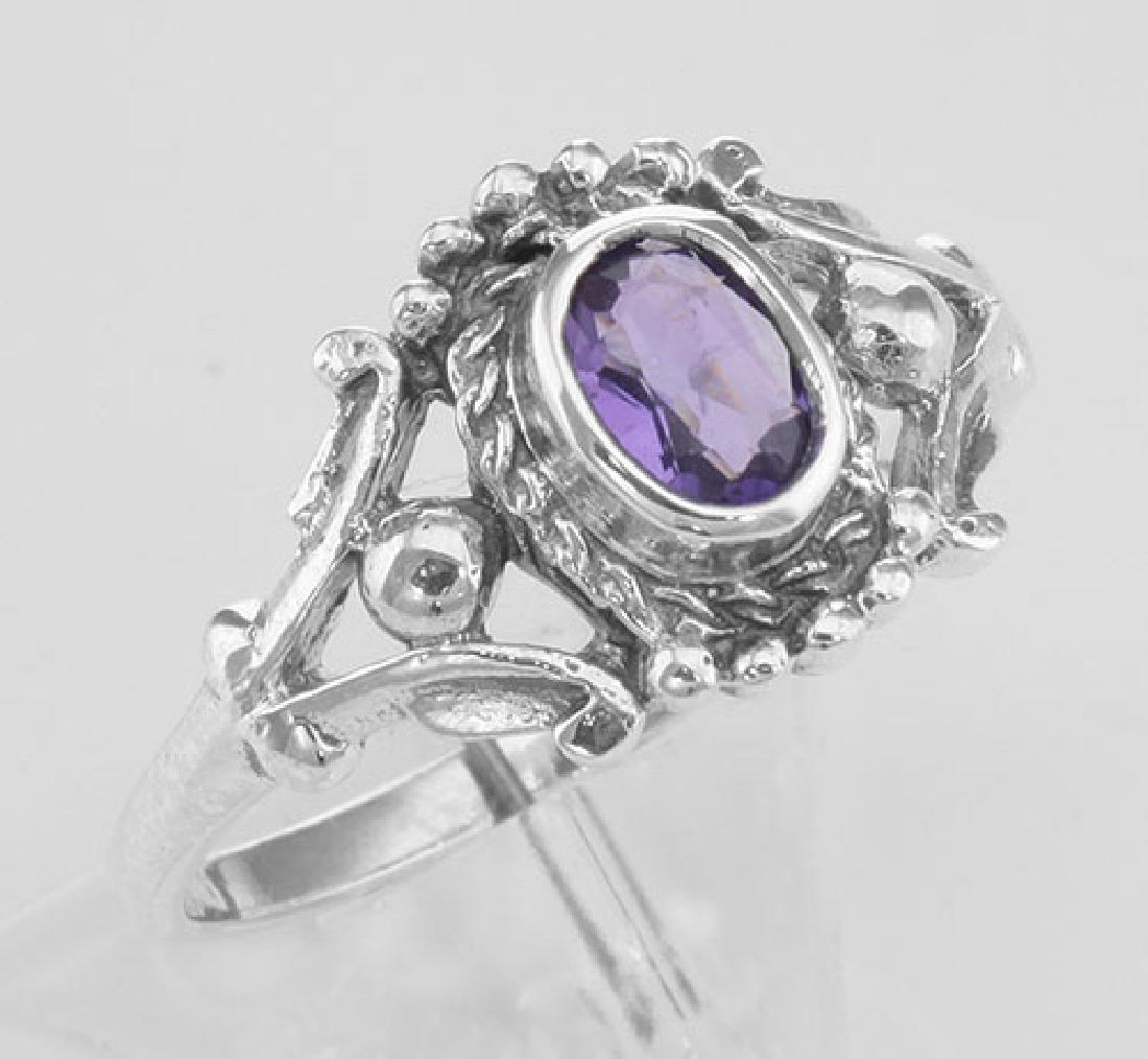Antique Style Genuine Amethyst Gemstone Ring - Sterling: Antique Style Genuine Amethyst Gemstone Ring - Sterling Silver **|**|** #R-1231-AM Antique Style Amethyst Ring made in fine Sterling Silver. This ring features a center mounted oval faceted Amethyst g
