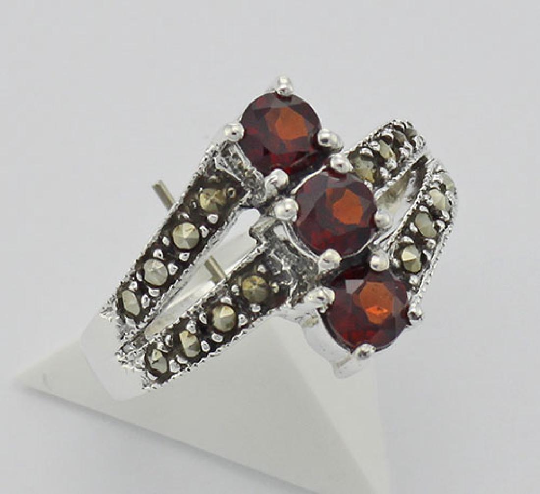 Antique Style Garnet Marcasite Ring - Sterling Silver: Antique Style Garnet Marcasite Ring - Sterling Silver **|**|** #R-610-G Metal : Sterling Silver | Stone : Marcasite, Garnet | Style : Ring | Height : 1/2 inch | Width : 3/4 inch | Approximate Weight :