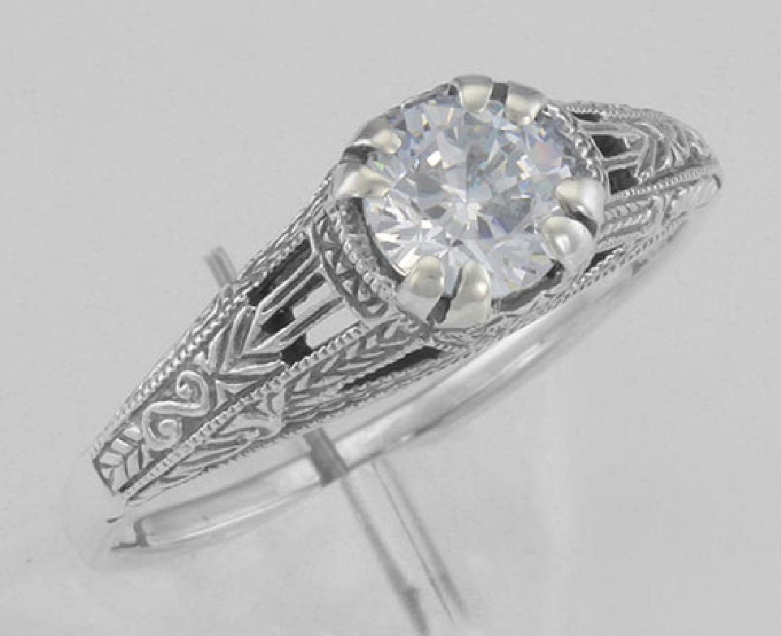 Antique Style CZ Filigree Ring Sterling Silver: Antique Style CZ Filigree Ring Sterling Silver **|**|** #FR-701-CZ Metal : Sterling Silver | Stone : CZ | Style : Rings | Height : 1/4 inch | Width : 5/8 inch | Approximate Weight : 2.4 grams | Carat 