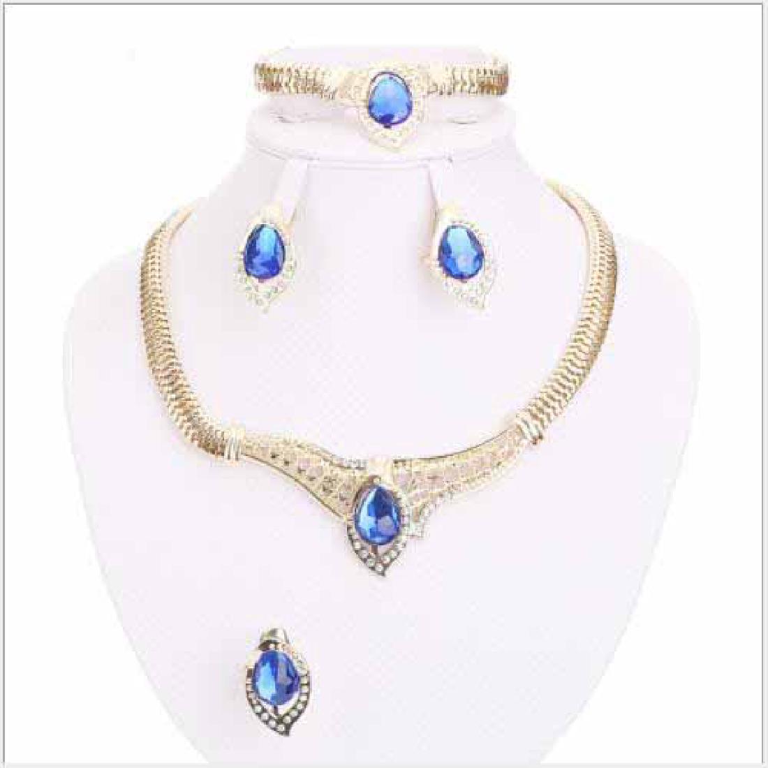 CREATED SAPPHIRE 18K GOLD PLATED GERMAN SILVER 4PCS SET: CREATED SAPPHIRE 18K GOLD PLATED GERMAN SILVER 4PCS SET **|**|** CREATED SAPPHIRE 18K GOLD PLATED GERMAN SILVER 4PCS SET #IRS74548