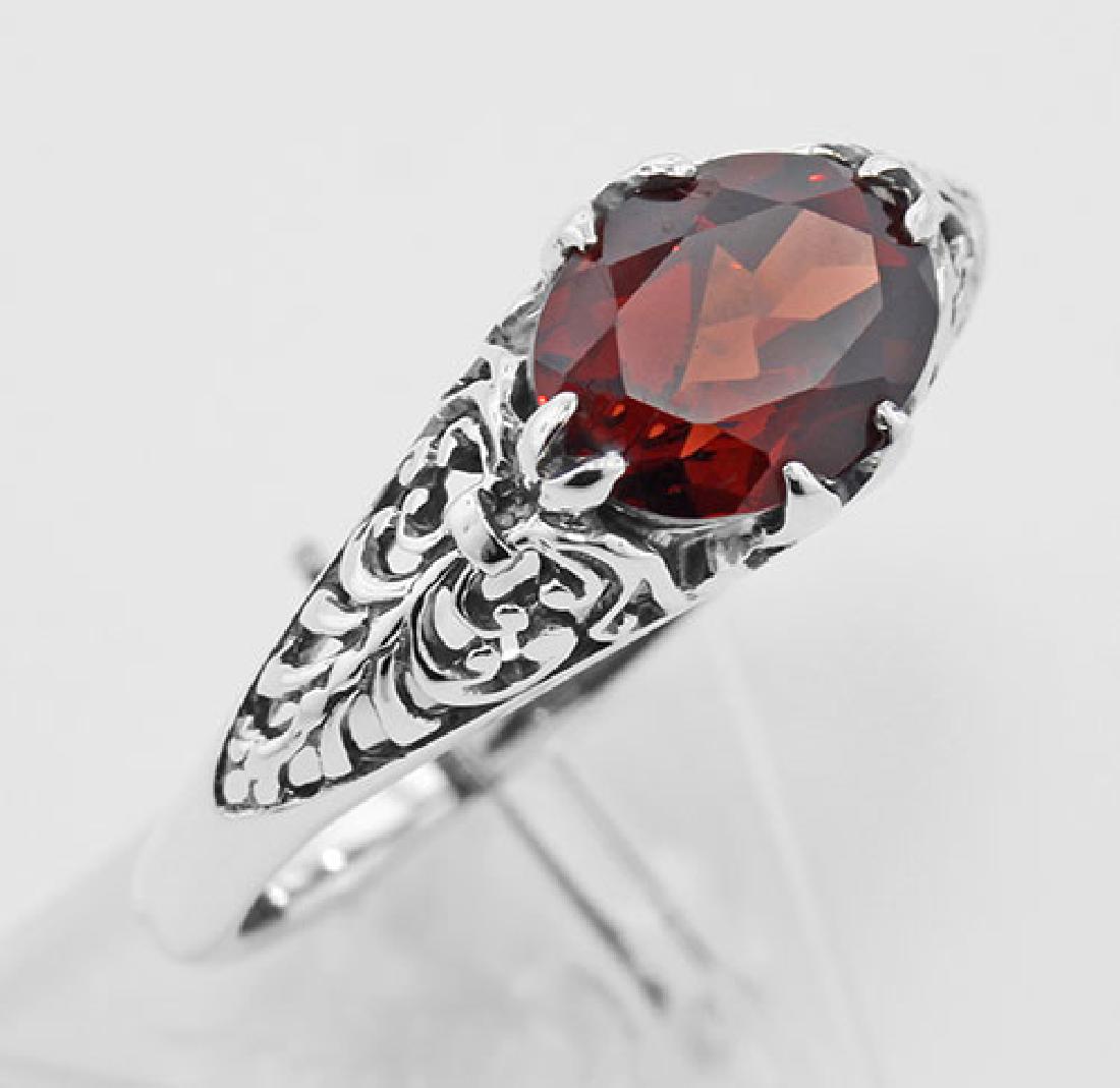 Antique Style Garnet Filigree Ring - Sterling Silver: Antique Style Garnet Filigree Ring - Sterling Silver **|**|** #FR-127-G This Antique Style Garnet Filigree Ring is hand crafted and finished in intricate sterling silver detail. Filigree rings are tim