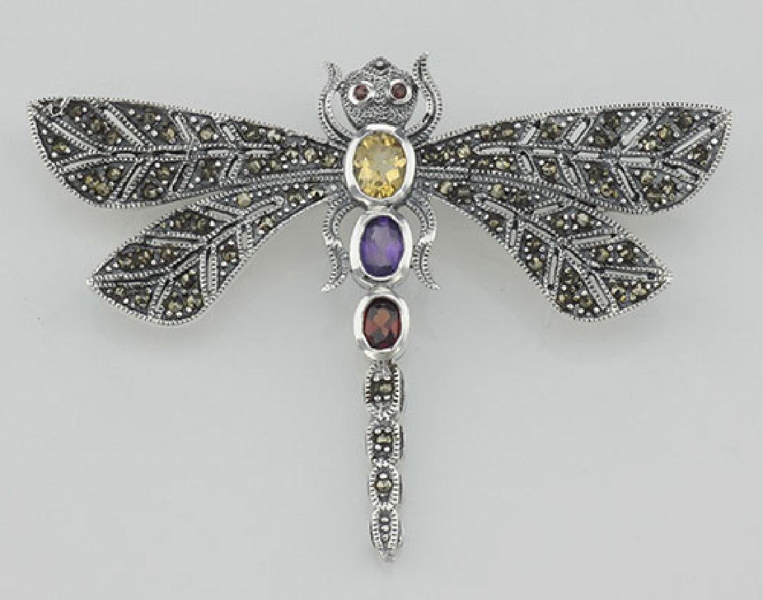 Multi Gemstone Marcasite Dragonfly Pin Sterling Silver: Multi Gemstone Marcasite Dragonfly Pin Sterling Silver **|**|** #P-139 Sterling Silver Multi Stone Dragonfly Pin / Brooch with Citrine, Amethyst and Garnet. This beautiful pin features 3 oval gemstone