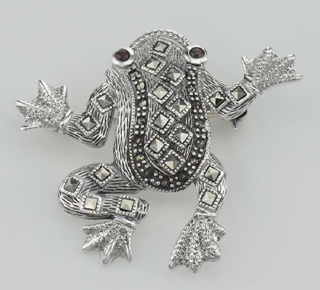 Marcasite / Garnet Frog Pin / Brooch - Sterling Silver: Marcasite / Garnet Frog Pin / Brooch - Sterling Silver **|**|** #P-145 Sterling Silver Marcasite / Garnet Frog Pin or Brooch - Sterling Silver pins / brooches. This brooch is new and a quality sterlin