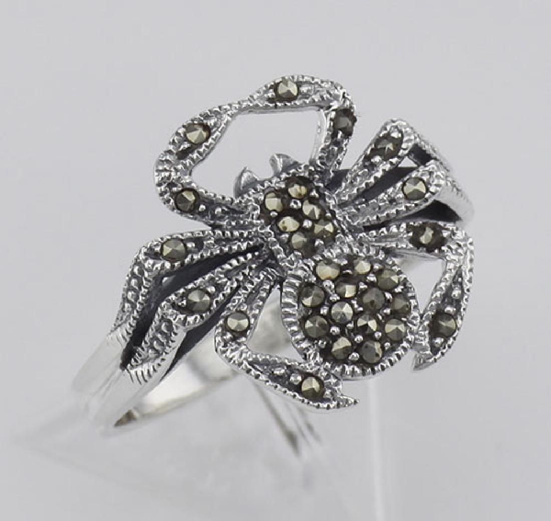 Marcasite Spider Ring - Sterling Silver: Marcasite Spider Ring - Sterling Silver **|**|** #R-413 Metal : Sterling Silver | Stone : Marcasite | Shape : Spider | Style : Ring | Height : 5/8 inch | Width : 5/8 inch | Approximate Weight : 3 gram