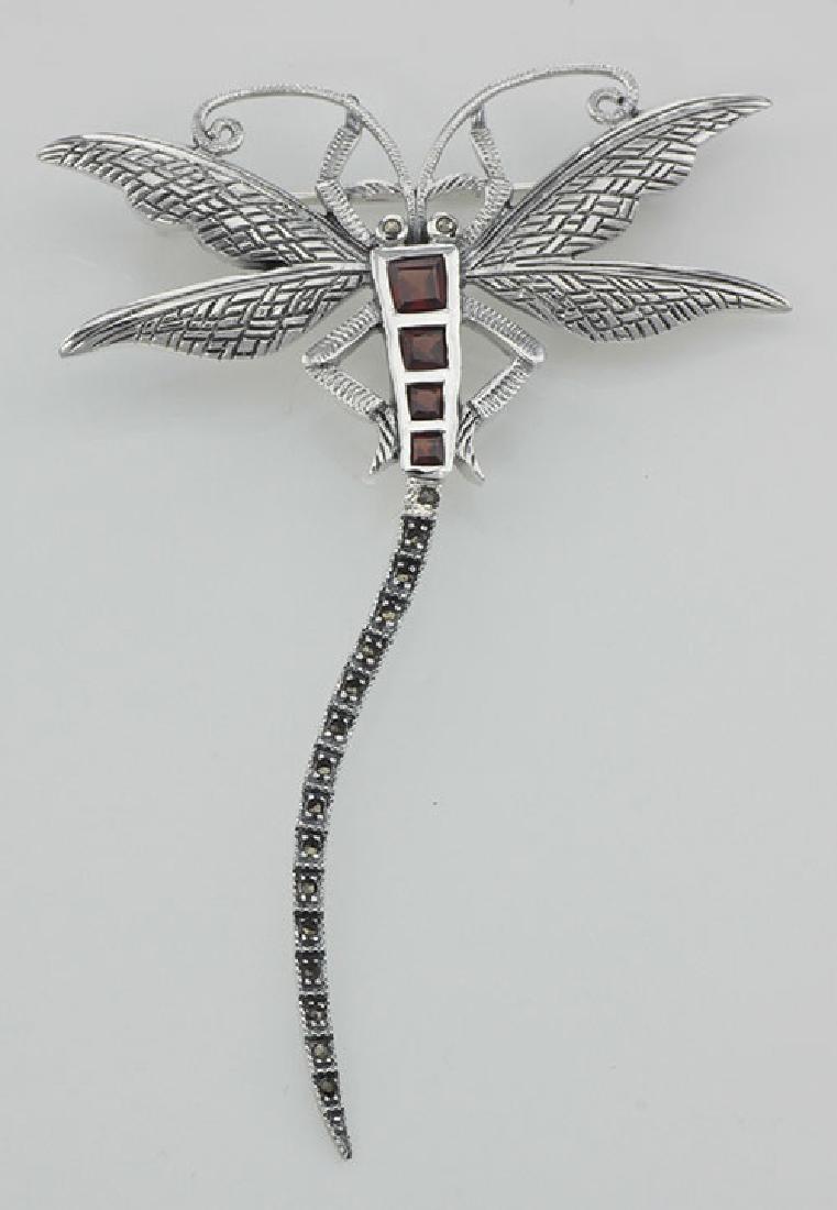 Marcasite / Garnet Dragonfly Pin or Brooch - Sterling S: Marcasite / Garnet Dragonfly Pin or Brooch - Sterling Silver **|**|** #P-148 Metal : Sterling Silver | Stone : Marcasite Garnet | Shape : Dragonfly | Style : Pin | Height : 3 1/8 inches | Width : 2 1/