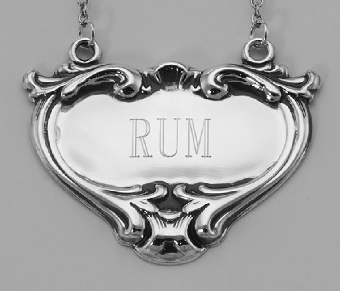 Rum Liquor Decanter Label / Tag - Sterling Silver: Rum Liquor Decanter Label / Tag - Sterling Silver **|**|** #LL-703 Sterling Silver Rum Liquor Decanter Label / Tag - This Rum Bottle Ticket measures approx. 1 7/8 inches W x 1 1/2 inches H. The chain