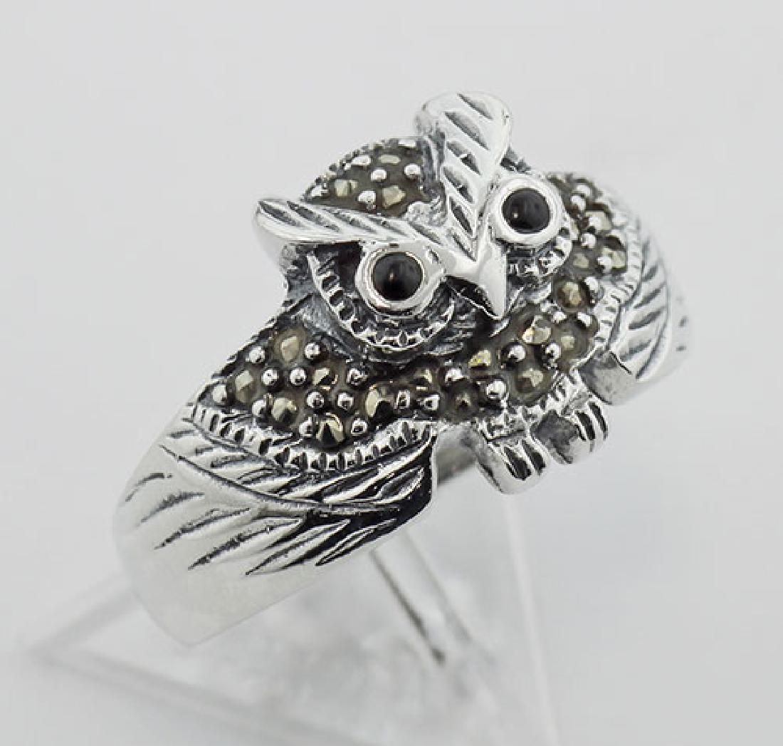 Marcasite Owl Ring w/ Onyx Eyes - Sterling Silver: Marcasite Owl Ring w/ Onyx Eyes - Sterling Silver **|**|** #R-603 Metal : Sterling Silver | Stone : Marcasite Onyx | Shape : Owl | Style : Ring | Height : 1/2 inch | Width : 3/4 inch | Approximate Wei