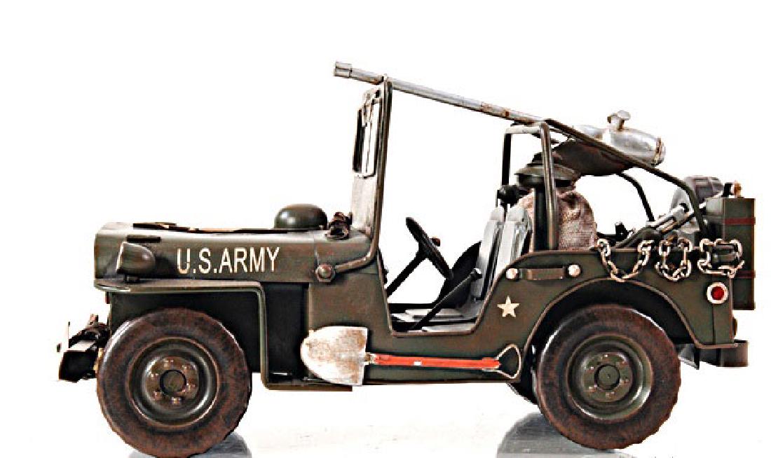 HAND MADE GREEN 1940 WILLYS-OVERLAND JEEP 1:12TH SCALE: HAND MADE GREEN 1940 WILLYS-OVERLAND JEEP 1:12TH SCALE **|**|** Drive back in time with this iconic 1940 Willy Overland Jeep from the World War II era. Handcrafted of iron with a scale of 1:12. This J