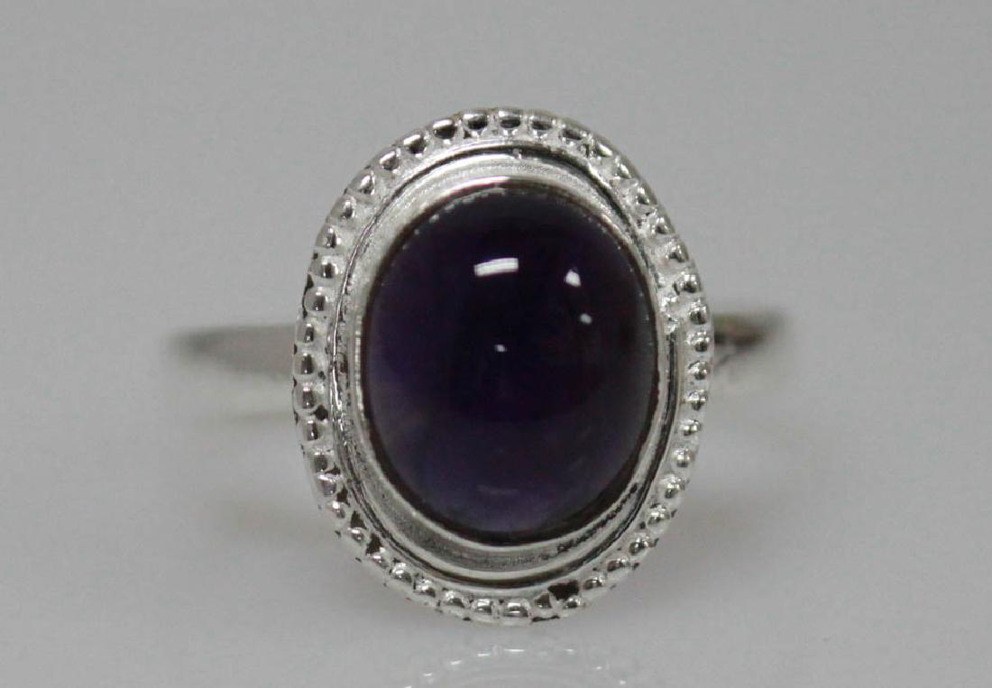 4.75 CTW Antique Style Amethyst Ring .925 Sterling Silv: 4.75 CTW Antique Style Amethyst Ring .925 Sterling Silv **|**|** Main stone: Amethyst; Stone Count;1. Weight: 4.75 CTW; Antique Style Ring; Shape: oval. Metal; .925 sterling silver #IRS52789